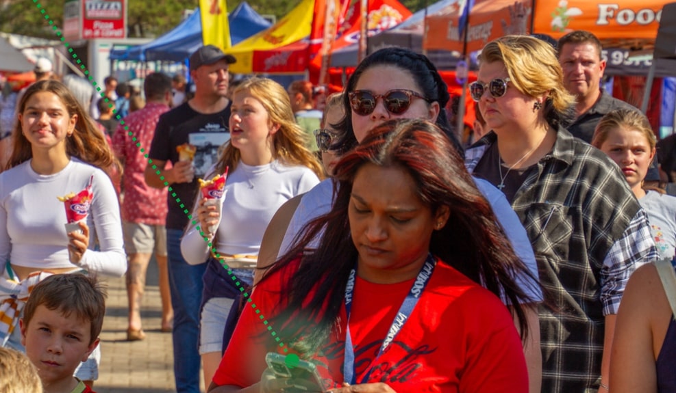 Skywire Leverages Siklu Solutions to Deliver Wireless Broadband Connectivity Throughout the Famous Innibos Festival in South Africa - woman using phone